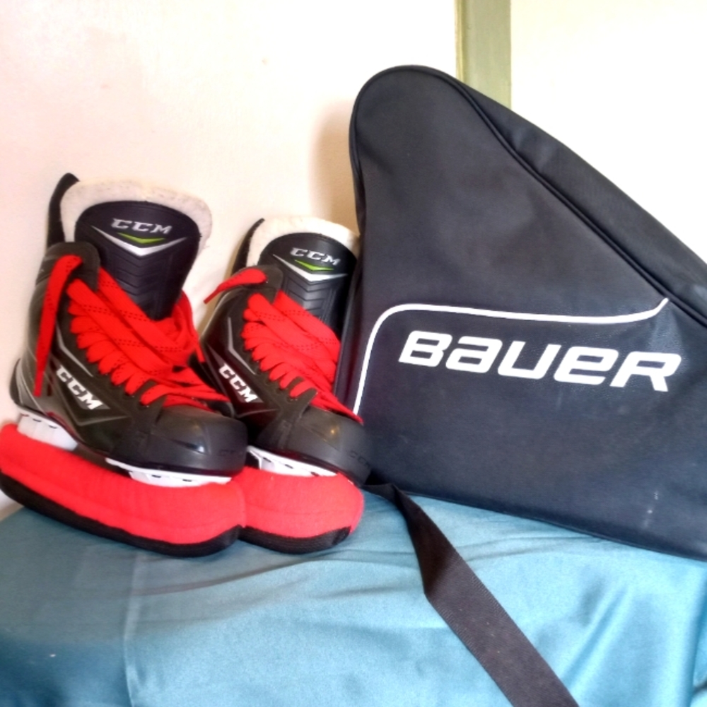 CCM Hockey skates size 6 black red laces